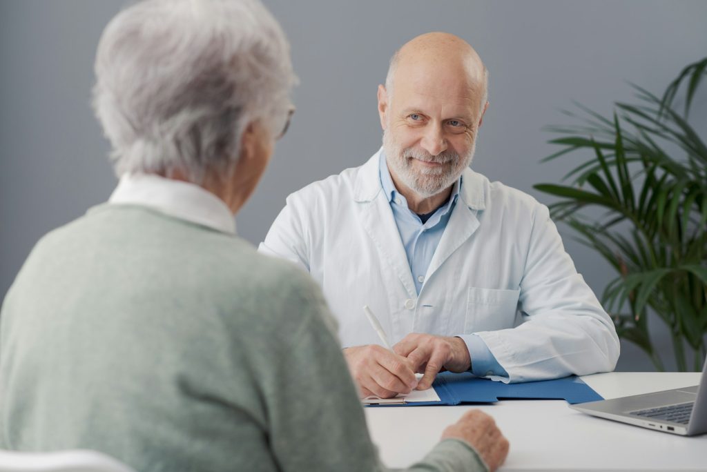 Doctor visiting a senior woman